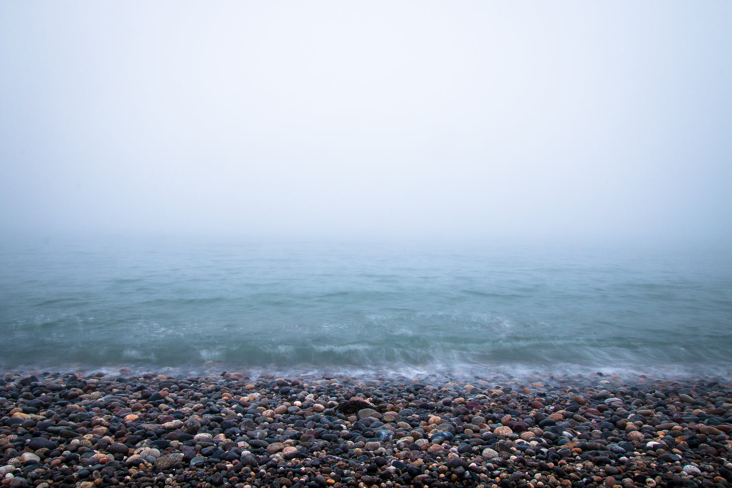 Subtle waves lapping on the shore